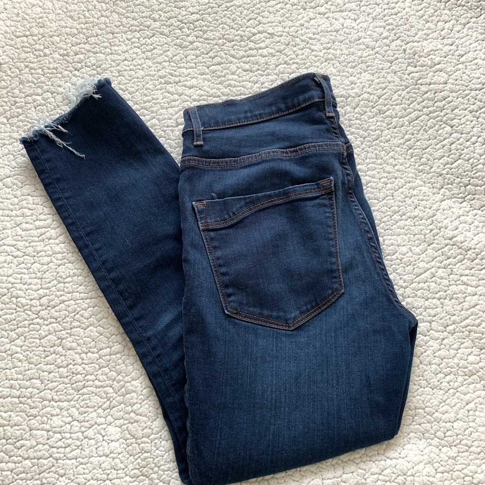 Express frayed skinny jeans